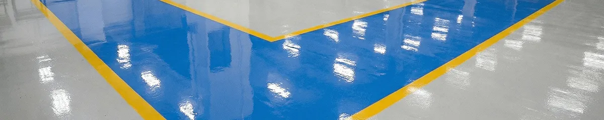 A factory floor professionally covered and marked with epoxy flooring in Evansville, IN