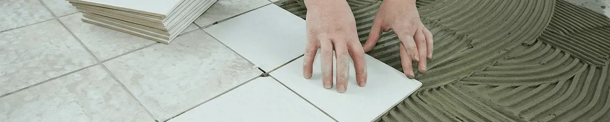 Professional installing white tile floors in Evansville, IN