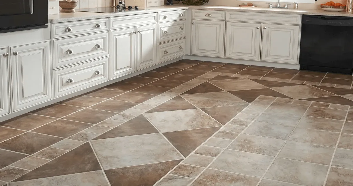 Kitchen with white cabinets and a professionally installed tile floor in Evansville, IN