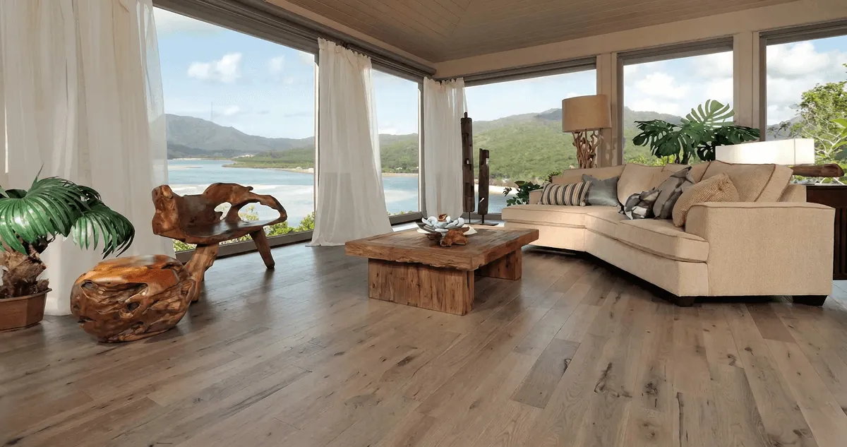 Professionally installed vinyl flooring in a modern living room with large windows in Evansville, IN
